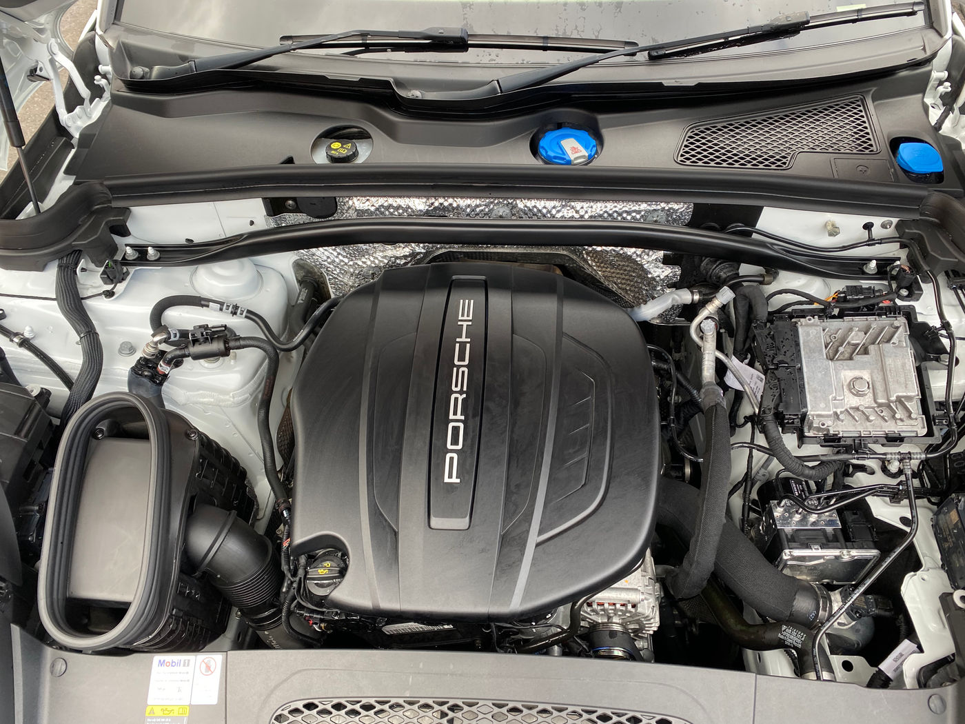 Engine bay clean on a Porsche Macan