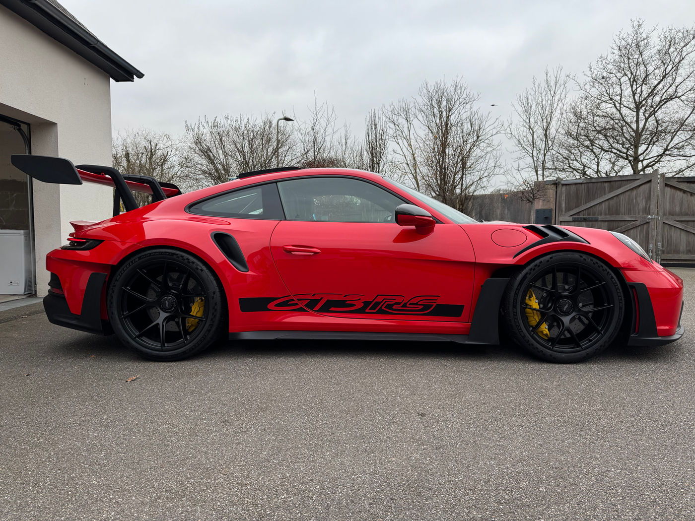 Porsche 911 GT3 RS in Guards Red, side profile after detailing