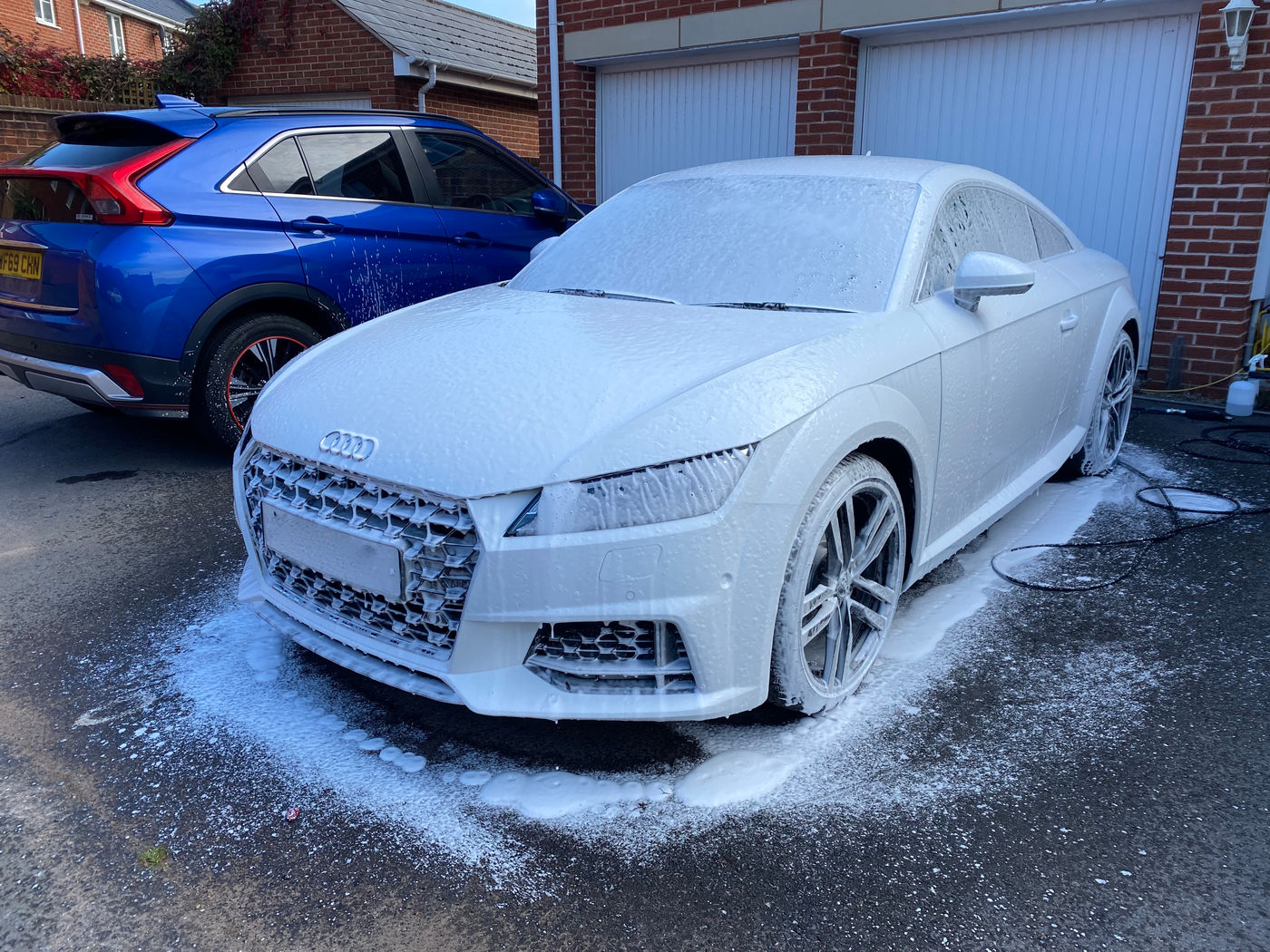 Audi TTS under a full coat of citrus snow foam during the pre wash